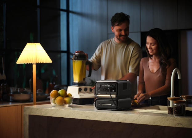 Father and daughter in emergency preparedness Compact RIVER 3 MAX battery generator with integrated carry handle powering a handheld radio and LED lantern during a nighttime search-and-rescue operation.”